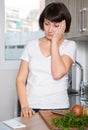 Sad woman tired of worries at kitchen Royalty Free Stock Photo