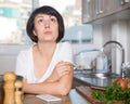 Sad woman tired of worries at kitchen Royalty Free Stock Photo