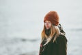 Sad Woman at winter beach cold sea outdoor depression emotions Lifestyle