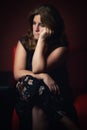 Sad, worried or nostalgic woman sitting lonely Royalty Free Stock Photo