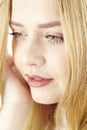 Sad young blond woman Royalty Free Stock Photo