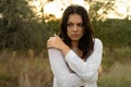 Sad young emotional woman wet under summer rain. Walk in the rain. Royalty Free Stock Photo