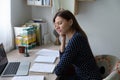 Sad young lady student feeling bored learning dull subject Royalty Free Stock Photo