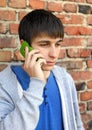 Sad Young Man with Cellphone Royalty Free Stock Photo