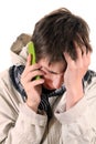 Sad Young Man with Cellphone Royalty Free Stock Photo