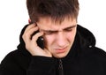 Sad Young Man with Phone Royalty Free Stock Photo