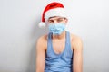 Sad Young Man in Santa Hat Royalty Free Stock Photo