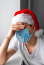 Sad Young Man in Santa Hat Royalty Free Stock Photo