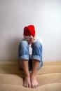 Sad Young Man in Santa Hat Royalty Free Stock Photo