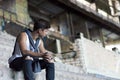 Sad young man sitting on the steps Royalty Free Stock Photo