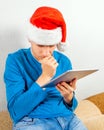 Sad Young Man with a Tablet Royalty Free Stock Photo