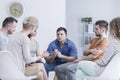 Young man during group meeting