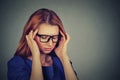 Sad young woman in glasses with worried stressed face expression Royalty Free Stock Photo