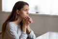 Sad young woman look in distance thinking of problems Royalty Free Stock Photo