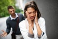 Sad young woman and man outdoor on street having relationship problems Royalty Free Stock Photo