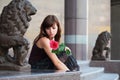 Sad young woman with a rose Royalty Free Stock Photo