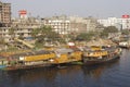 Sadarghat boat terminal and Buriganga riverside residential area in Dhaka, Bangladesh.