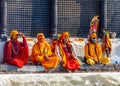 Sadhu men in orange clothes in Pashupatinath temple in Kathmandu