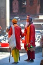 Sadhu men seeking alms in Durbar square. Kathmandu, Nepal