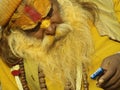 Sadhu with mobile phone in Shivaratri