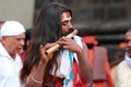 Sadhu plays flute