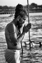 A Sadhu in prayer in river Ganga in Allahabad, India Royalty Free Stock Photo