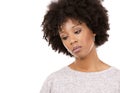 Depressed black casual woman on white background Royalty Free Stock Photo