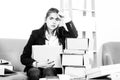 Sadness depressed businesswoman with many folders of documents, frustration secretary girl, stressed employee working Royalty Free Stock Photo