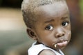 Sadness Despair Depression Symbol: Little African Black Boy Crying Sadly. Little African sad boy. Royalty Free Stock Photo