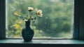 Sadness and grief, A wilted flower in a broken vase on a windowsill fragility. Royalty Free Stock Photo