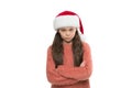 Sadness and irritation. Anxiety concept. Mental wellbeing. Something bothers her. Winter spirit. Santa claus kid. Little Royalty Free Stock Photo