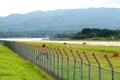 Sado airport fence in Sado island, Niigata, Japan. Its operation is indefinitely suspended.