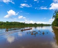 Two Safari Boats Sailing Amidst Suriname Jungle