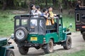 Safari. Off-road jeep with family visitors. Minneriya. Sri Lanka.