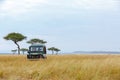 Safari Tour Vehicle in Kenya Grasslands Royalty Free Stock Photo