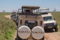 Safari tourists looking for wild animals
