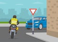 Motorcycle turns right on sharp turn with `give way` sign. Possible accident with oncoming vehicle. Royalty Free Stock Photo