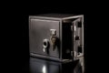 safe deposit box, with keyhole and lock, on black background Royalty Free Stock Photo