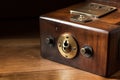 safe deposit box, with keyhole and lock visible, placed inside wooden Royalty Free Stock Photo