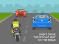 Safe driving rules and tips. Don`t drive the wrong way on the road. Motorcycle rider riding wrong direction on the road. Royalty Free Stock Photo