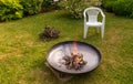 A safe fireplace in the backyard garden. Royalty Free Stock Photo