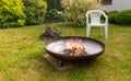 A safe fireplace in the backyard garden. Royalty Free Stock Photo