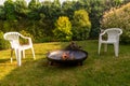 A safe fireplace in the backyard garden. Royalty Free Stock Photo