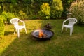 A safe fireplace in the backyard garden. Royalty Free Stock Photo