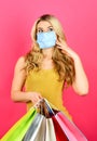 Safe and healthy shopping. woman in respirator mask with paper bags. shopper protect herself from coronavirus pandemic Royalty Free Stock Photo