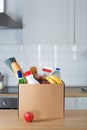 Safe home delivery. A box of food on the modern kitchen