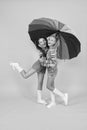 Safe place. Schoolgirls happy umbrella. Fall weather forecast. Safety concept. Fashion accessory. Girls friends with