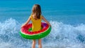 Safe rest with a child on the water. Storm warning. Rescue of drowning people. Royalty Free Stock Photo