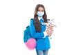 Safe to learn during COVID-19. Kid wear mask holding toy. Safe return to school. Student safety