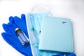 Safe travel concept. Passport and vaccination kit: vaccine, syringe, mask and protective gloves on a white background. Royalty Free Stock Photo